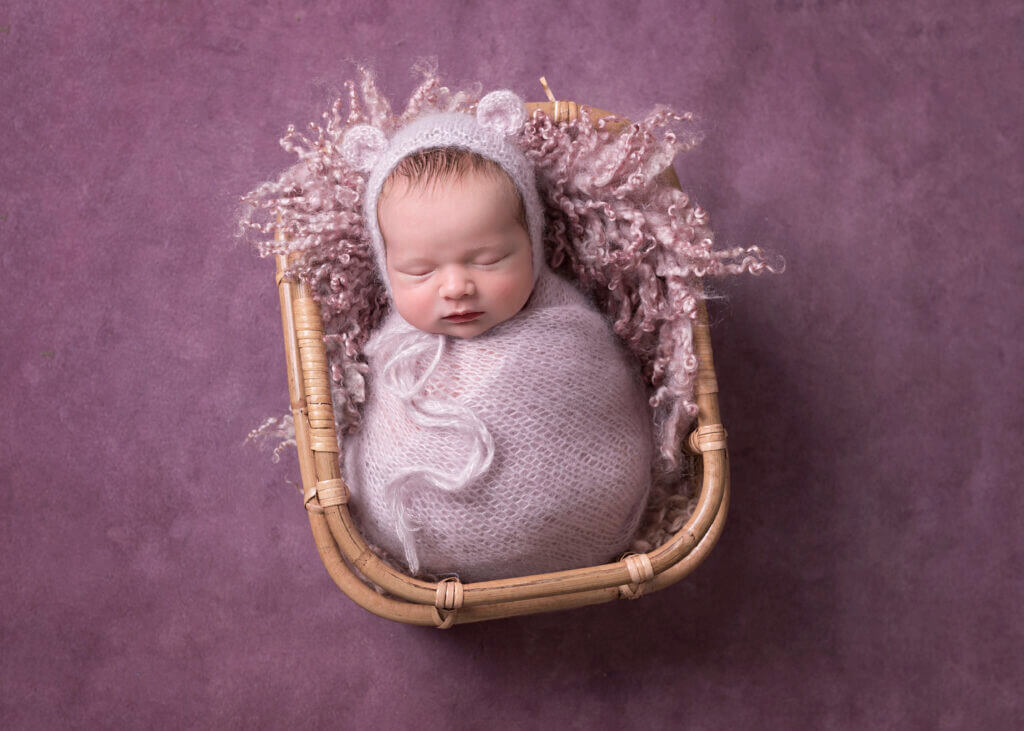 Cute newborn girl in basket, Newborn Photographer Birmingham